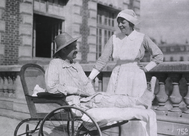 American nurse talking to a French patient at Red Cross Hospital No. 1.