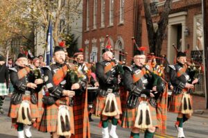 men in kilts playing pipes