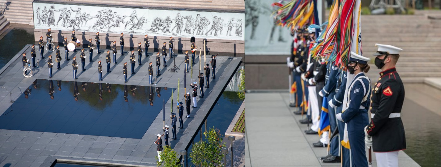 The U.S. Army Band "Pershing's Own" plays as the Star Spangled Banner is raised for the first time over the new National World War I Memorial in Washington, DC.